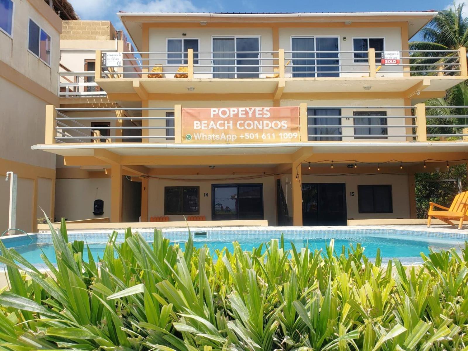 Beach Club Budget Rooms At Popeyes Кей-Колкер Экстерьер фото